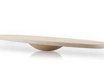 May include: A wooden balance board with a light-colored, layered top and a rounded, cork-like base. The board is designed for exercise and stability training, with a natural, minimalist aesthetic.