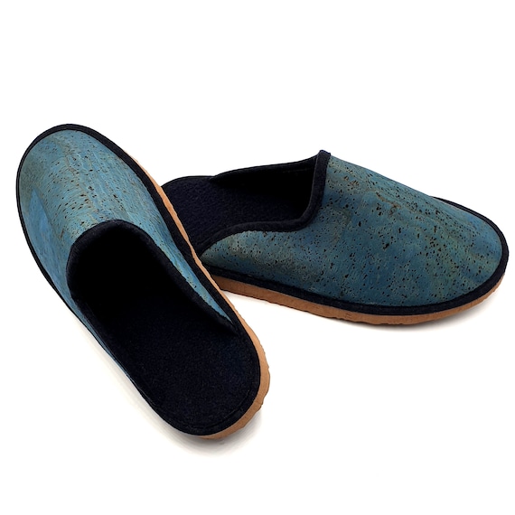 Women's feet wear warm slippers on the m... | Stock Video | Pond5