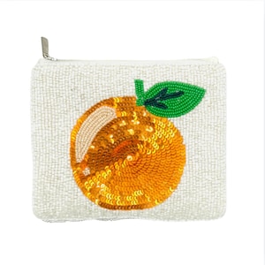 May include: A white beaded zippered pouch with a beaded orange and green leaf design.