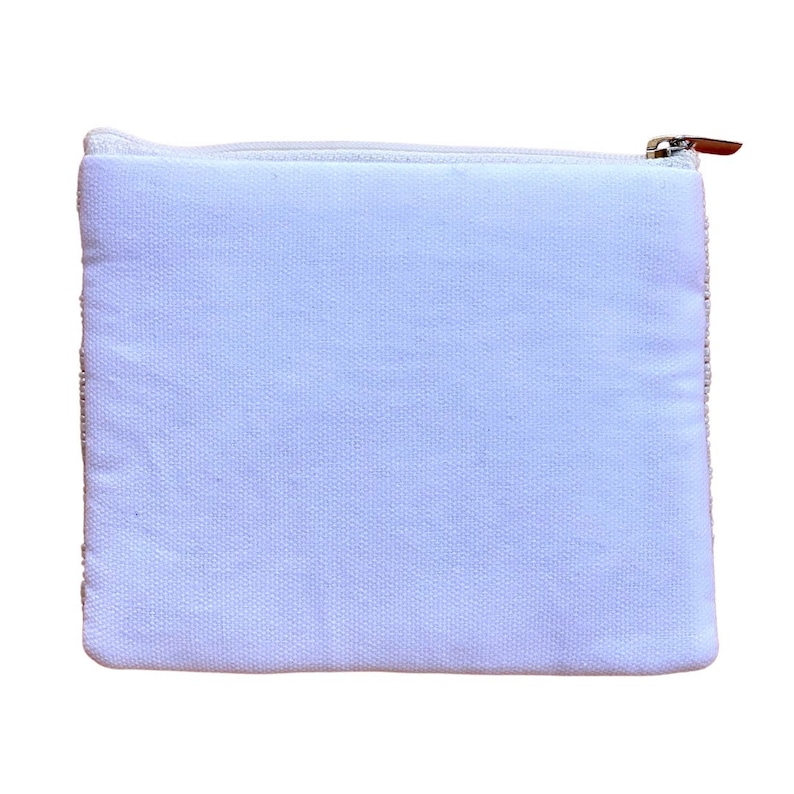 May include: A white canvas zippered pouch with a white zipper.
