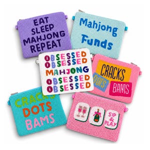 May include: Six rectangular beaded pouches with zipper closures. Designs include text reading EAT SLEEP MAHJONG REPEAT, Mahjong Funds, OBSESSED MAHJONG, CRACKS DOTS BAMS, and illustrations of mahjong tiles with wine glasses and a bottle.