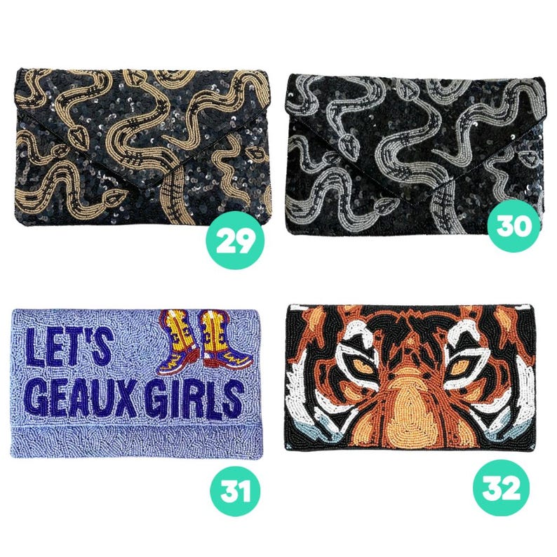 May include: Four rectangular beaded clutch bags. Number 29 is black with gold snakes. Number 30 is black with silver snakes. Number 31 is light blue with the text LET'S GEAUX GIRLS and cowboy boots. Number 32 features a tiger face design.