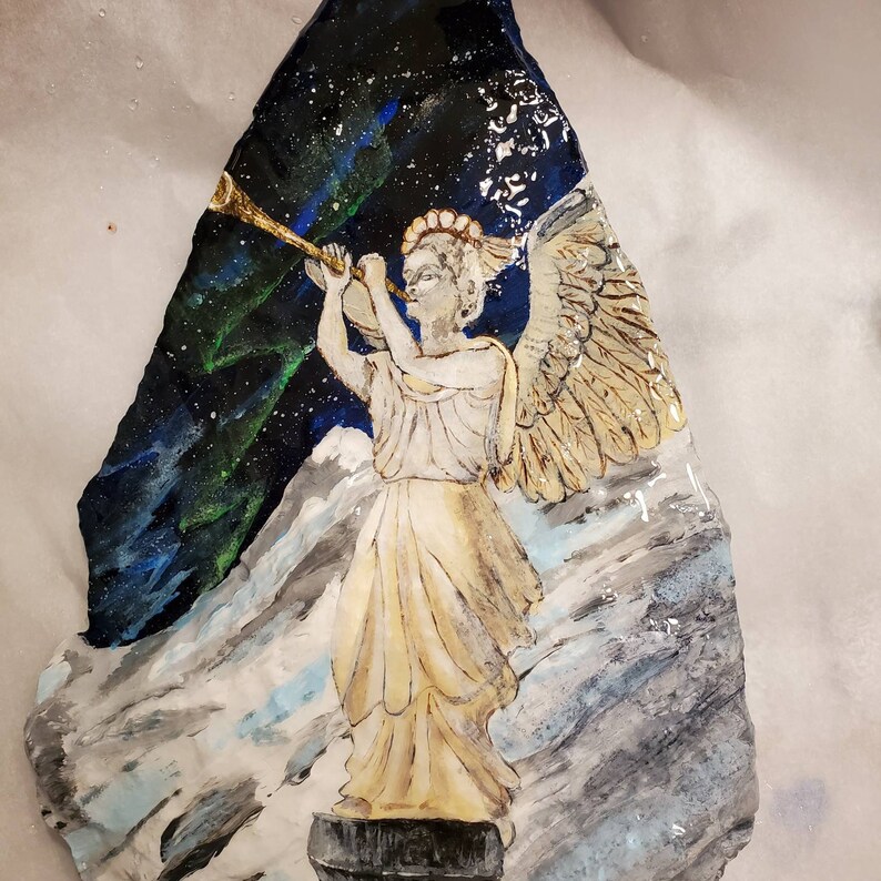 trumpet night Angel mountainside holy beautiful arora borealis religious Christmas statue winter snow