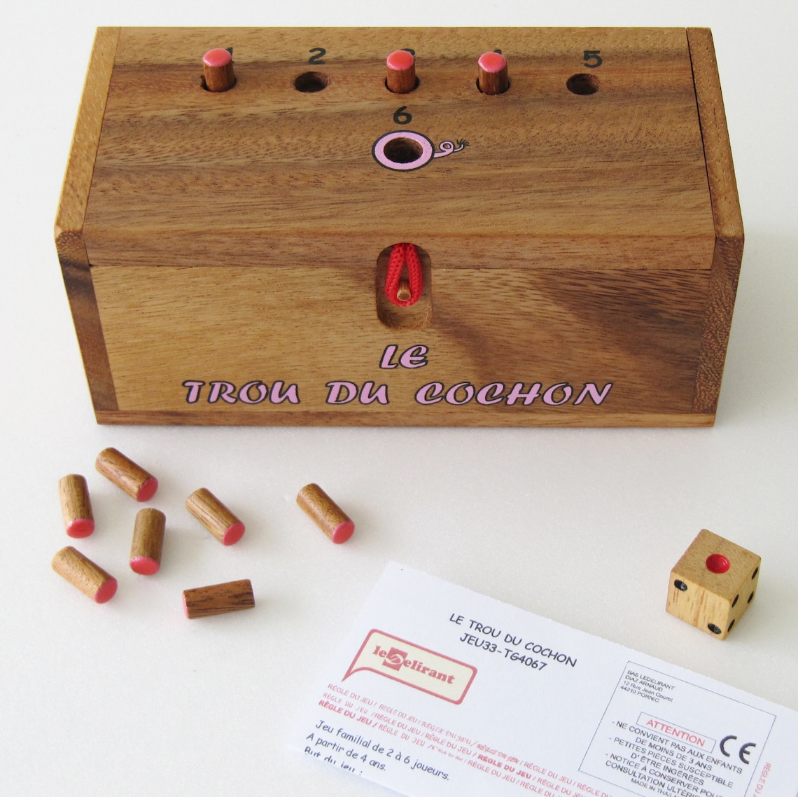 Le TROU DU COCHON® jeu de société familial de 2 à 6 joueurs, à partir de 4 ans, en bois massif Le TROU DU COCHON® jeu de société familial de 2 à 6 joueurs, à partir de 4 ans, en bois massif