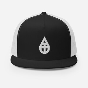 May include: Black and white trucker hat with a white water drop logo featuring a cross inside. The hat has a black front panel and a white mesh back panel.