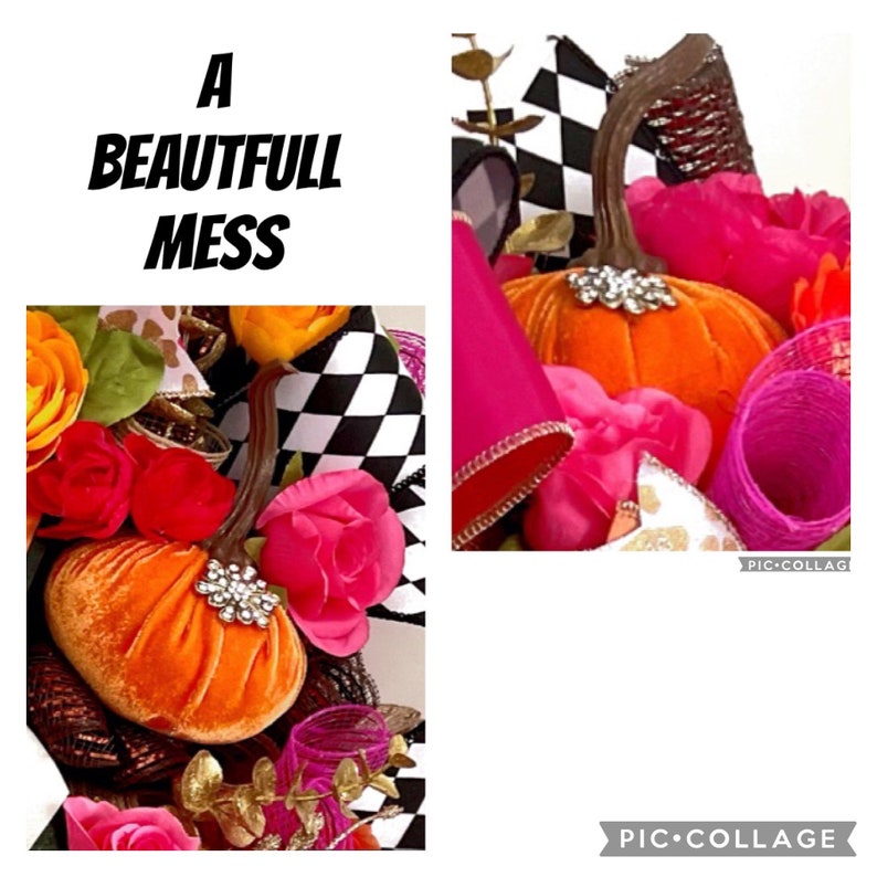 May include: A wreath with a black and white checkered ribbon, pink and orange velvet pumpkins, pink roses, and gold accents. The wreath is decorated with the text "A BEAUTIFULL MESS".
