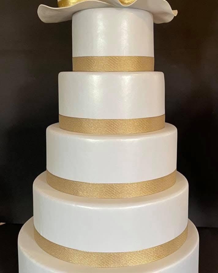 Scenic cake bases covered in EVA rubber with a complimentary satin ribbon.