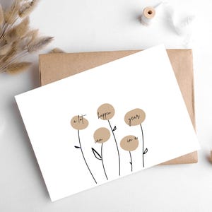 Biglietto "A lot can happen in a year"/ da Hygge Cards, myhyggeshop.com/ Illustrazione floreale minimalista con messaggio stimolante/