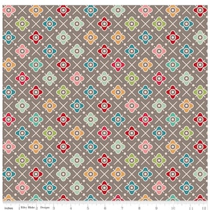 May include: A fabric pattern featuring a repeating floral design in various colors, including red, blue, green, and orange, set against a gray background. The design is arranged in a grid pattern with white cross and dot accents. The fabric is 12 inches wide.