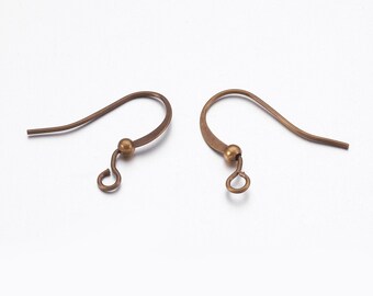 May include: Two antique bronze-colored earring hooks. Each hook features a curved design with a small ball and a loop at the bottom for attaching charms or beads. The hooks are designed for pierced ears.