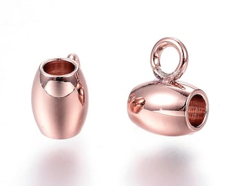 May include: Two rose gold-colored metal bead end caps. Each cap has an oval shape with a hole at one end for stringing and a loop for attaching to other jewelry components. The caps are designed to finish off the ends of beaded strands.