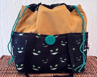 Duży neonowy potwór o zielonych oczach i złowieszczym uśmiechu Torba na projekt: Robiona na szydełku torba ze ściągaczem