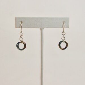 Dangling Mobius Earrings in Peacock Rainbow Niobium and Silver Enameled Copper
