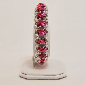 Linked Knots Cuff in Red and Pink Anodized Aluminum and Bright Aluminum