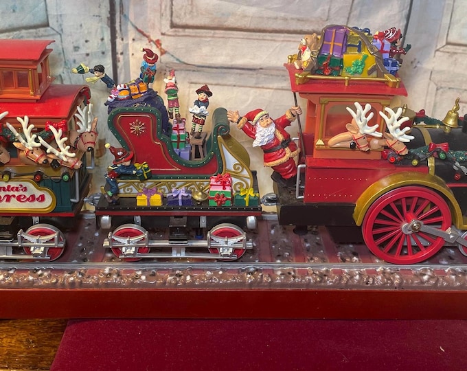 Santa Musical Train Set Mr. Christmas Santa's Express Musical Train Working Lights and Plays 20 ...