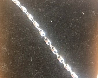 Stunning rhodium infinity link bracelet
