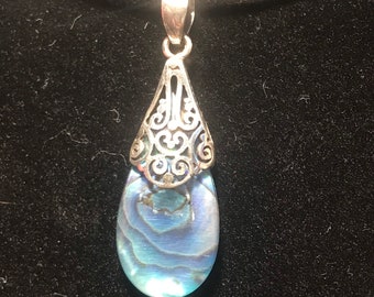 Beautiful Abalone and sterling silver pendant on snake chain.