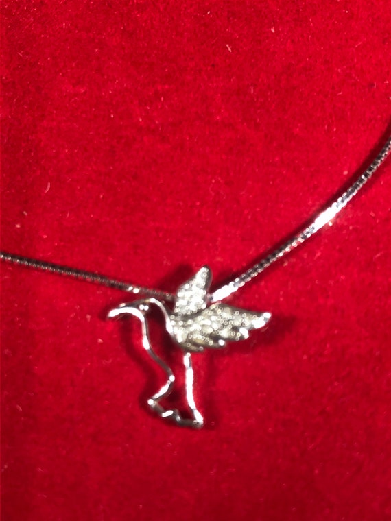 Dainty adorable little sterling silver hummingbird