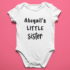 Baby&#39;s Little Sister Personalized Baby Onesie® - Customized Baby Sister&#39;s Name Onesie® - Unique Baby Sister Outfit - Cute Little Sister Baby