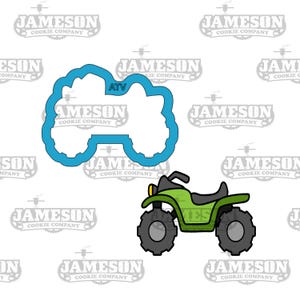 May include: A green ATV cookie cutter with the word "ATV" in the center. The cutter is outlined in blue and is surrounded by a white background.