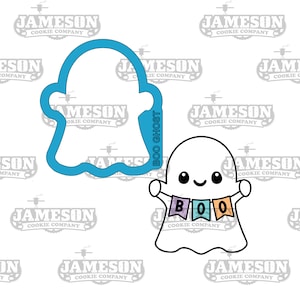 May include: A blue cookie cutter in the shape of a ghost with a white ghost holding a banner that says "BOO" in colorful letters.