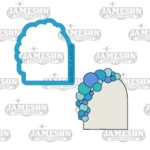 May include: A blue cookie cutter in the shape of an arch with a bubble design. The cutter is on a white background with the text "BUBBLE ARCH" written vertically on the right side of the cutter.