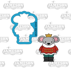 May include: A cookie cutter in the shape of a mouse wearing a crown and a red and white coat. The mouse is standing with its arms at its sides. The cookie cutter is blue and the mouse is grey. The text "MOUSE KING" is written vertically on the side of the cookie cutter.