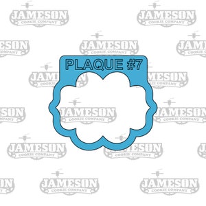 May include: A blue cookie cutter shaped like a cloud with the text "PLAQUE #7" above it.