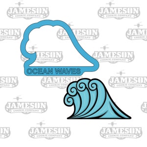 May include: A blue cookie cutter shaped like an ocean wave with the text "OCEAN WAVES" underneath. The cutter is on a white background with the text "JAMESON COOKIE COMPANY" repeated in the background.