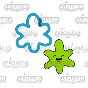 May include: Two cookie cutters: a blue splat-shaped outline and a green splat with a smiling face. The green splat has a pink mouth. The blue cutter has the word "SPLAT" on it. The background is white with the words "JAMESON COOKIE COMPANY" repeated.