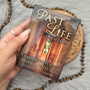 Past Life Oracle Cards by Doreen Virtue and Brian L. Weiss, M.D., 44 card deck with companion guidebook and original box - USED