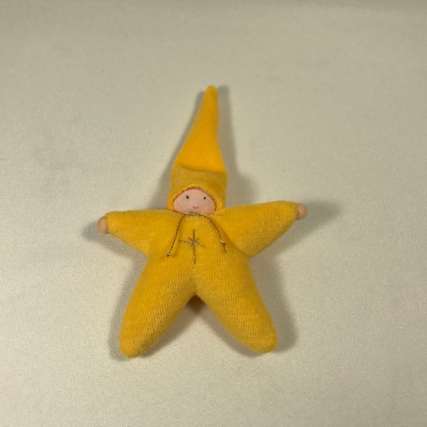 Lovely star baby.  Pocket doll.