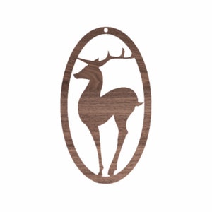 May include: A wooden ornament shaped like an oval with a deer silhouette cut out. The ornament is made of dark brown wood and has a hole at the top for hanging.