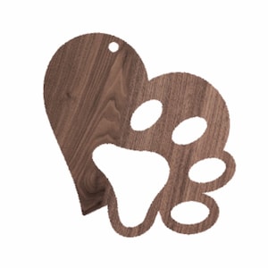 May include: A wooden heart-shaped ornament with a paw print cut out. The ornament is made of dark brown wood with a natural grain pattern.