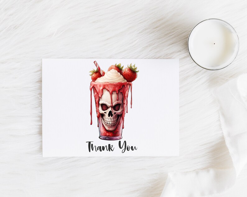 May include: A thank you card featuring a red and white strawberry milkshake with a skull face and the words "Thank You" printed on the card.