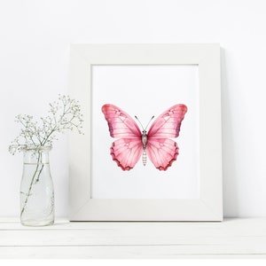 May include: A white frame with a pink butterfly illustration inside. The butterfly has a light pink body and dark pink wings.