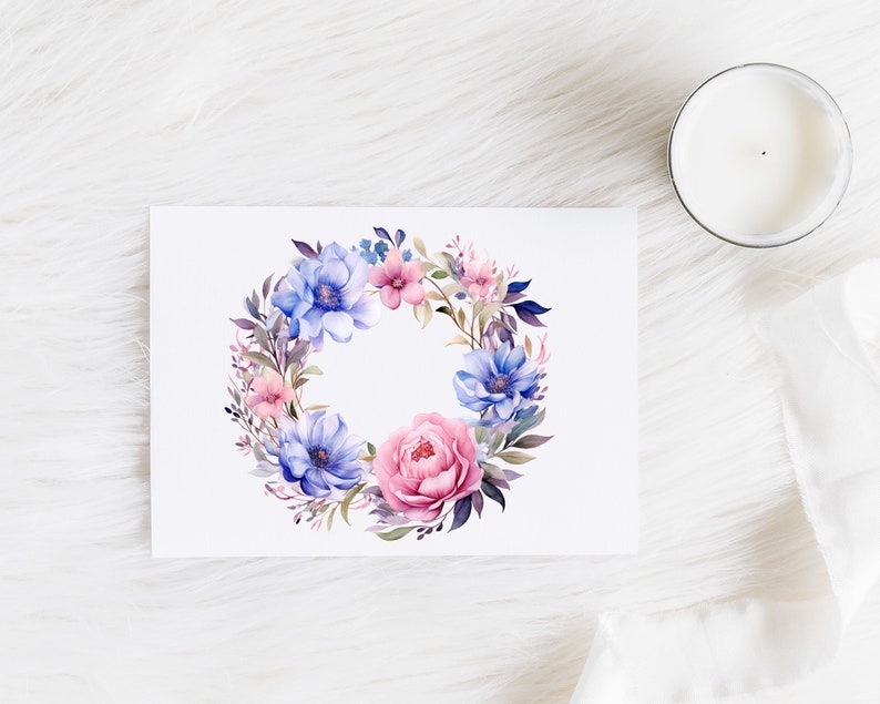 May include: A watercolor wreath with pink and blue flowers and green leaves. The wreath is on a white background.