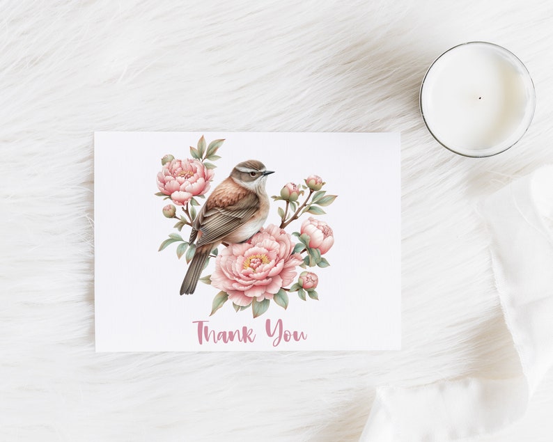 May include: A thank you card with a watercolor illustration of a brown bird perched on a branch with pink peonies. The text "Thank You" is written in pink below the bird.