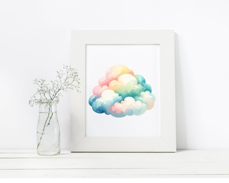 Puede incluir: Una pintura de acuarela de una nube arco&iacute;ris en un marco blanco. La nube est&aacute; compuesta por m&uacute;ltiples formas esponjosas en tonos de rosa, amarillo, azul y verde.