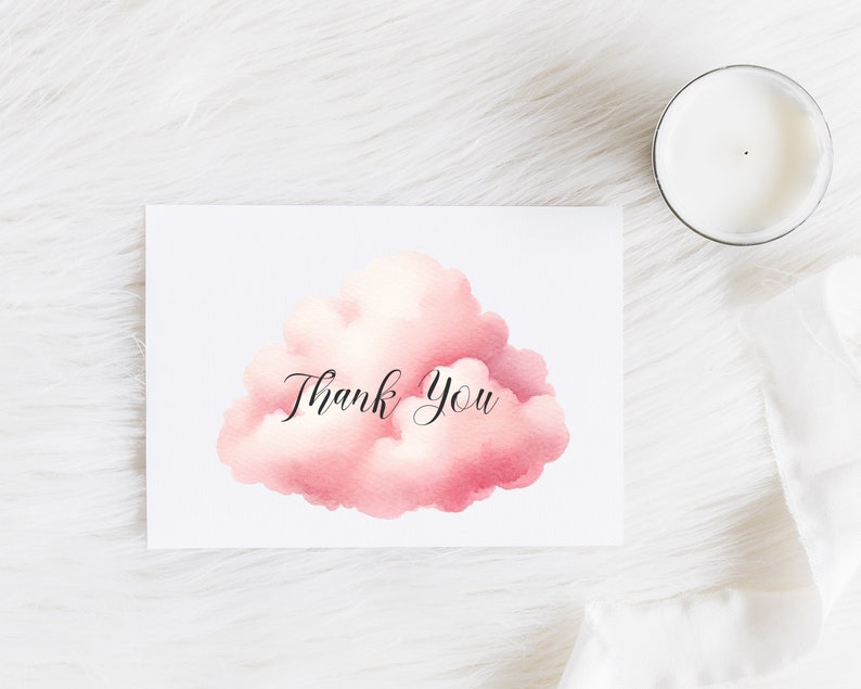 Puede incluir: Una tarjeta blanca con una nube rosa de acuarela con el texto "Gracias" escrito en negro.