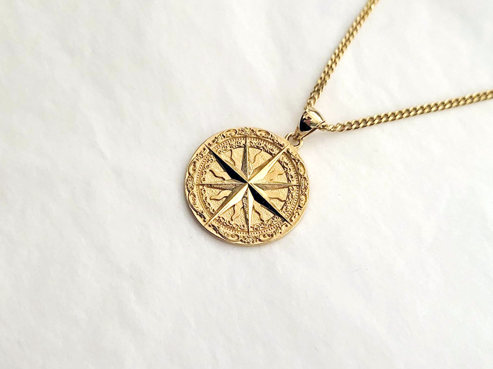 Gold store compass jewelry