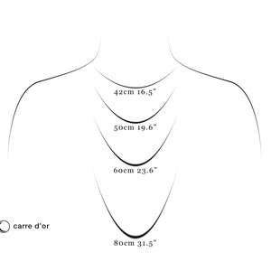 May include: A line drawing of a person's neck with four different necklace lengths marked in inches and centimeters. The lengths are 16.5 inches (42 cm), 19.6 inches (50 cm), 23.6 inches (60 cm), and 31.5 inches (80 cm).