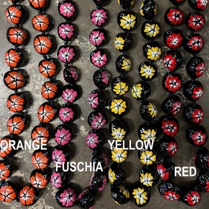 Orange, Fuschia, Yellow and Red Kukui Lei