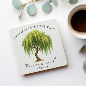 May include: Square coaster with a willow tree illustration. The text reads "I Willow -ays Love You!" with the names "Jason & Katie" and "9 Years" below the tree. The coaster is cream-colored with a white background.