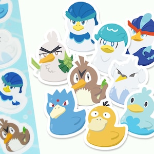 May include: A set of 12 Poke Duckies stickers featuring various Pokemon characters as rubber duckies. The stickers are printed on white paper with a glossy finish. The stickers are arranged in a random pattern on a white background. The text "Poke Duckies Sticker Set" is printed at the bottom of the image.