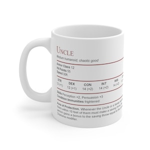 May include: White ceramic mug with a brown outline and text that reads "UNCLE" and includes a Dungeons and Dragons character sheet with stats for a character named "Uncle".