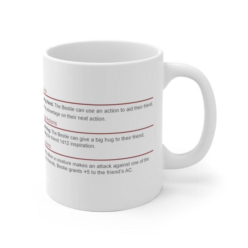 May include: White ceramic mug with a brown text description of a "Bestie" character with special abilities. The text reads: "Hand. The Bestie can use an action to aid their friend.  The Bestie can give a big hug to their friend.  When a creature makes an attack against one of the Bestie's friends, Bestie grants +5 to the friend's AC."