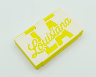 Louisiana Hit Kit. Case for your smokes + lighter. Embedded magnets secure it shut!