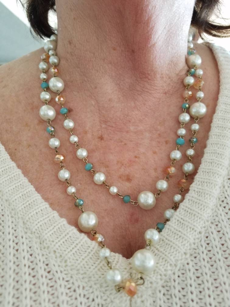 Vintage faux pearls: 125,700 ppm Lead. 90 ppm is unsafe. Please don't let  your children play with grandma's faux pearls!