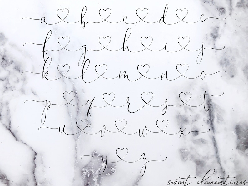 May include: A handwritten alphabet with each letter featuring a heart design. The letters are written in a cursive script style.